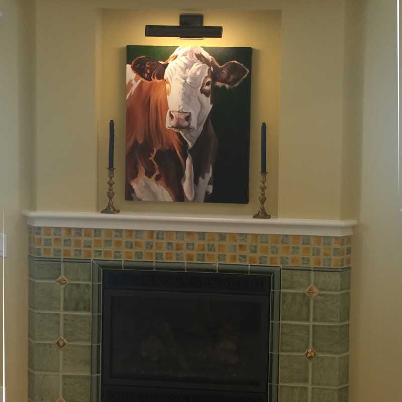 Fireplace tile tilery cape cod . love the cow.